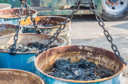 Oily waste (spent oil & sludge drums)